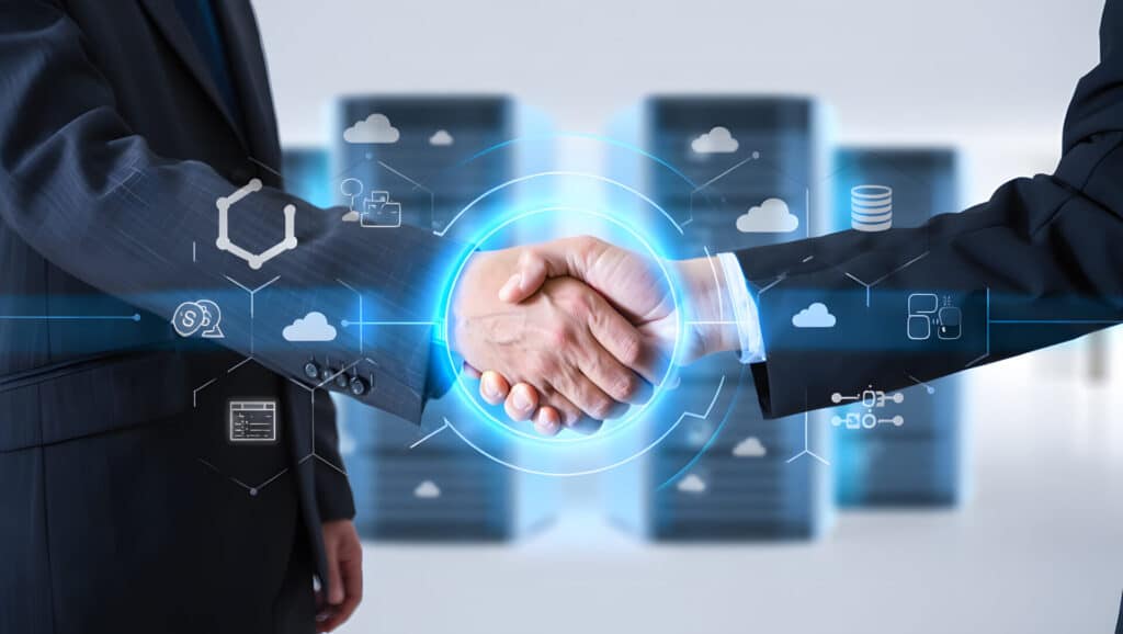 Two people in business suits shake hands before blurred server racks, with tech icons and a blue glow symbolizing partnership with a managed IT company.